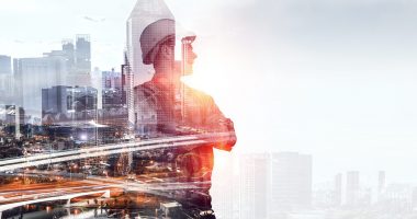 Man standing against a city scape
