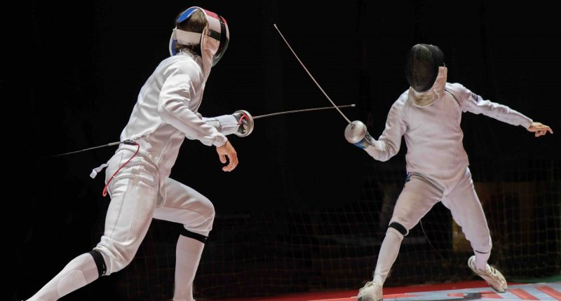 Fencing fight concept